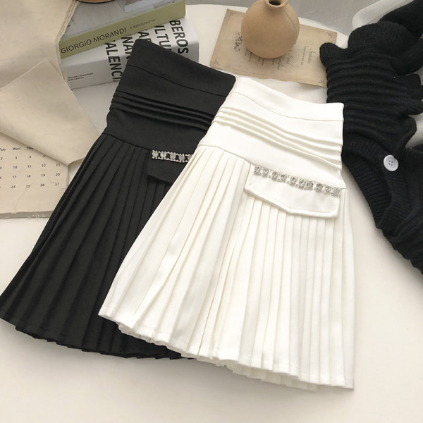 Sieviešu kroku svārki ar akmeņiem viduklī