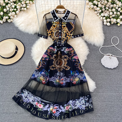 Modern women`s dress with patterned pattern and tulle pieces
