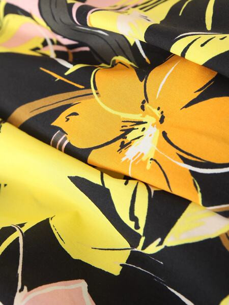 Lillemotiivide ja V-kaelusega naiste suvekleit