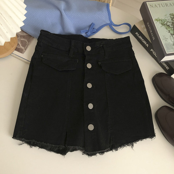 Naiste nööpide ja rebenenud motiividega teksaseelik