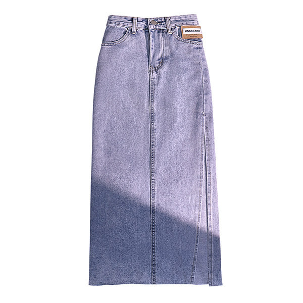 Pikk teksaseelik taskute ja embleemiga