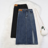 Naiste pikk teksaseelik kõrge vöökoha ja taskutega