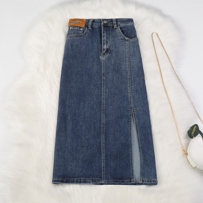 Naiste pikk teksaseelik kõrge vöökoha ja taskutega