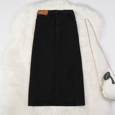 Naiste pikk teksaseelik kõrge vöökoha ja taskutega