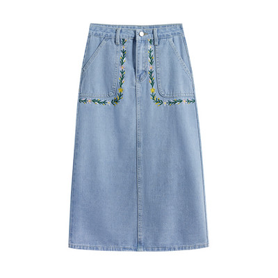 Naiste kõrge vöökoha ja tikandiga teksaseelik