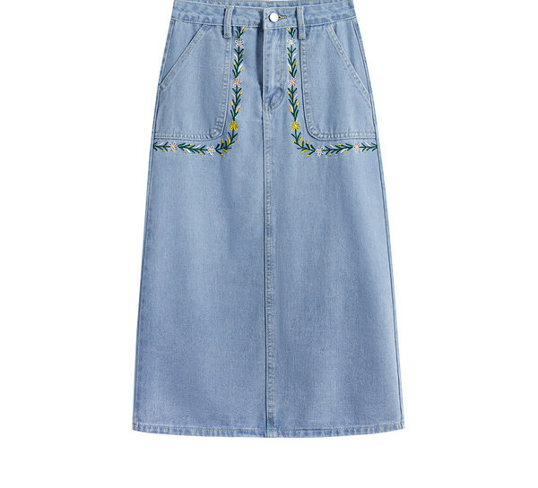 Naiste kõrge vöökoha ja tikandiga teksaseelik