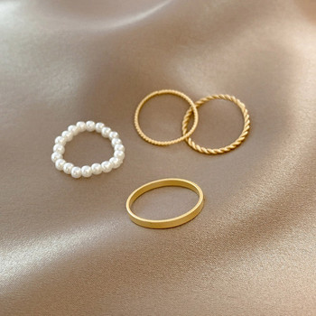 Дамски комплект пръстени-халки от четири броя - златисти и перли