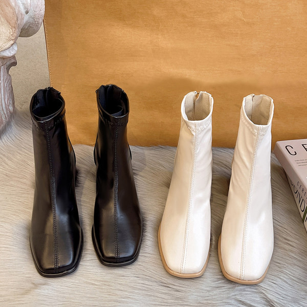 Дамски кожени боти с цип в черен и бял цвят 