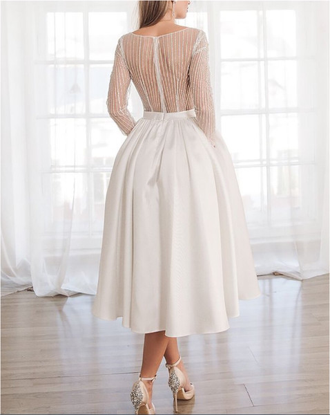 Дамска разкроена рокля с дълъг ръкав