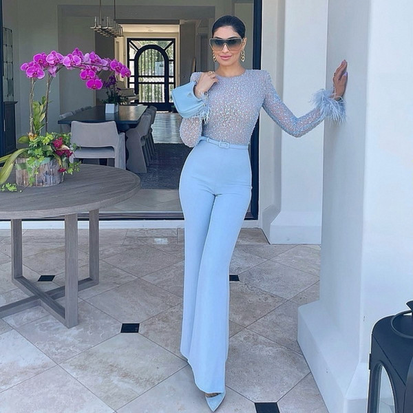 Елегантни дамски гащеризон с пера и пайета