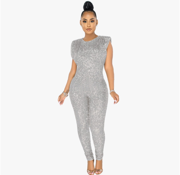 Mitmes värvitoonis läikiv naiste kombinesoon vööga