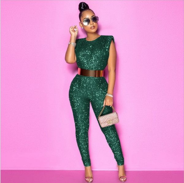 Mitmes värvitoonis läikiv naiste kombinesoon vööga