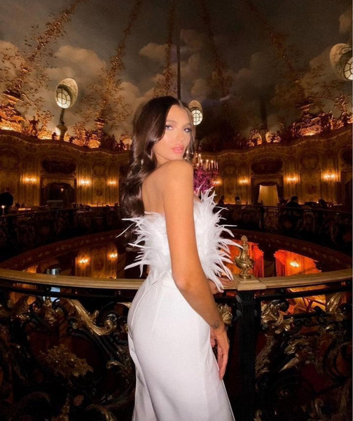 Elegantne sulgedega kombinesoon