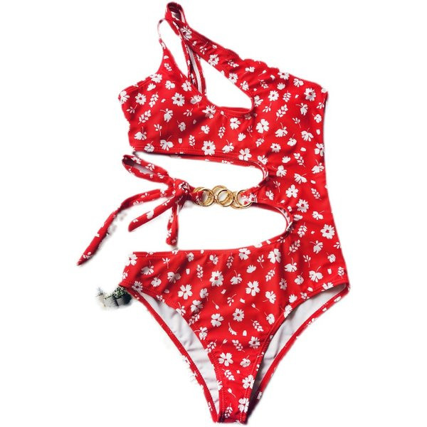 Női teljes fürdőruha kivágásokkal, fém díszítéssel