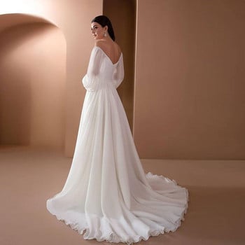 Γυναικείο μακρύ φόρεμα με γυμνούς ώμους σε λευκό χρώμα