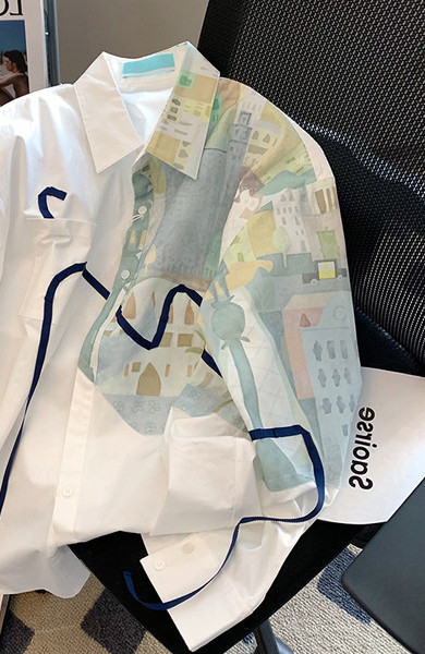 Modern női ing rátéttel és gombos rögzítéssel