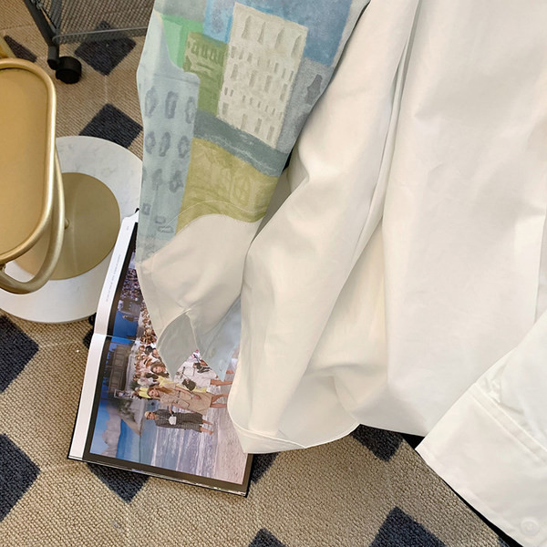 Modern női ing rátéttel és gombos rögzítéssel