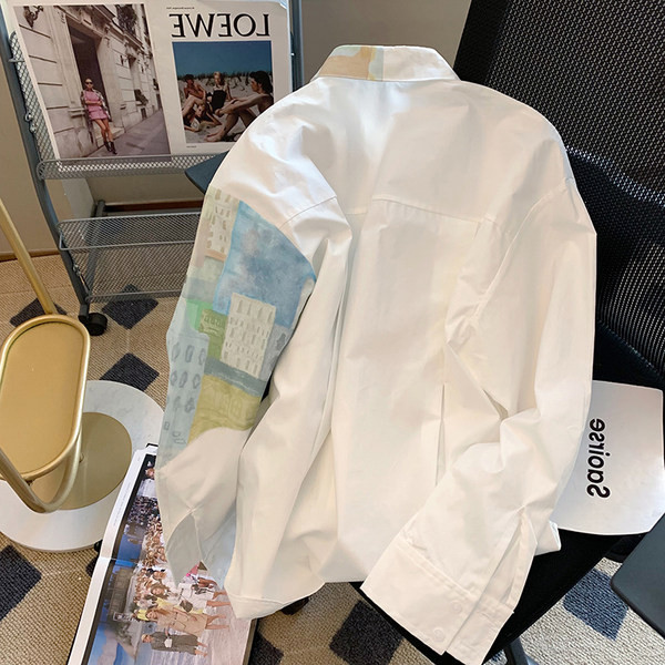 Modern női ing rátéttel és gombos rögzítéssel