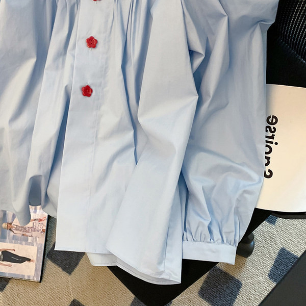 Košulja ženskog kroja s uvojcima u plavoj boji