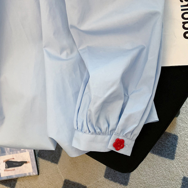 Košulja ženskog kroja s uvojcima u plavoj boji