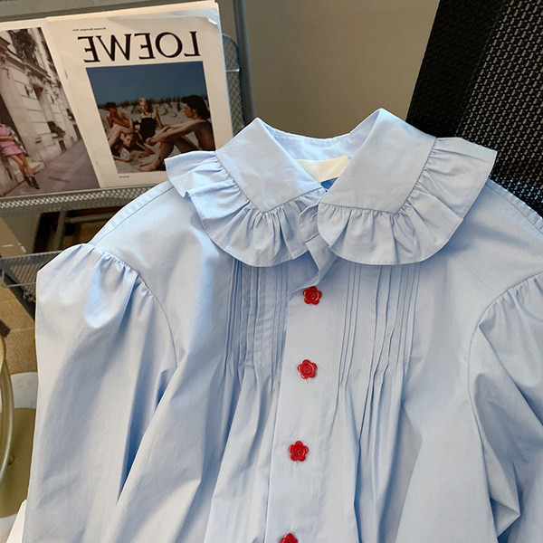 Košulja ženskog kroja s uvojcima u plavoj boji