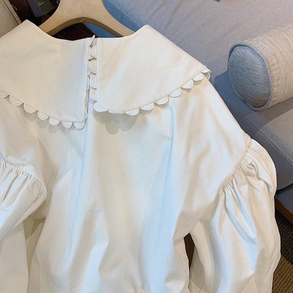 Moderna ženska asimetrična košulja bijele boje