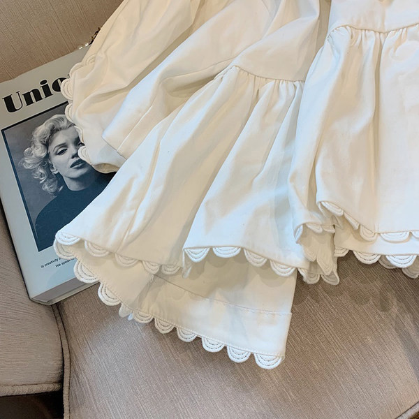 Moderna ženska asimetrična košulja bijele boje