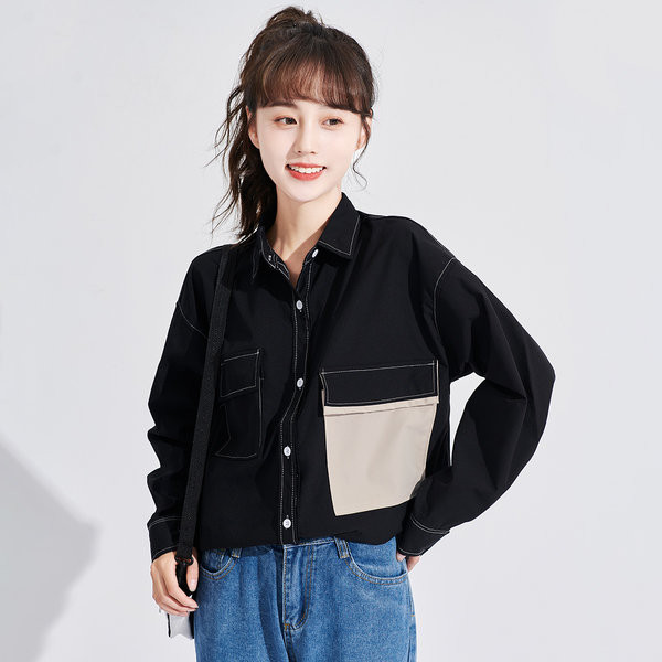 Naiste särk musta värvi suure taskuga