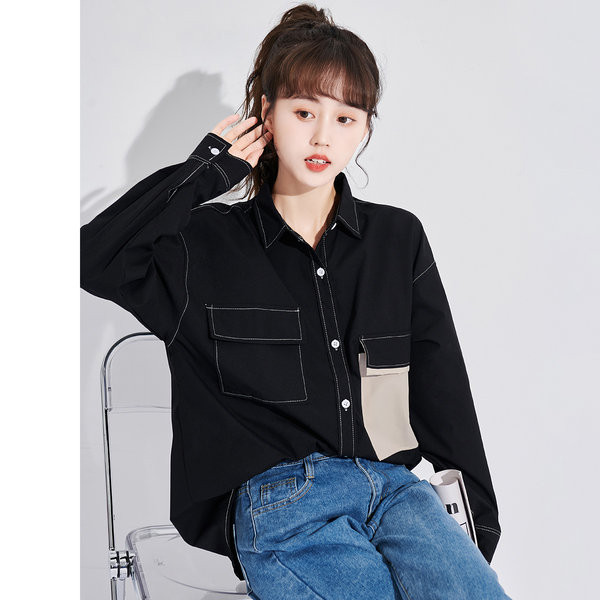 Naiste särk musta värvi suure taskuga