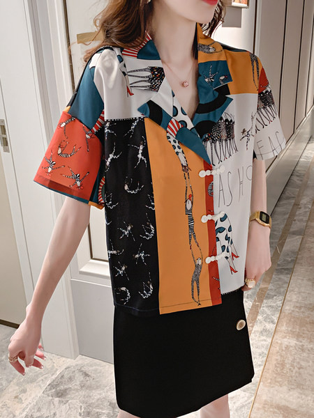 Lühikeste varrukate ja aplikatsiooniga naiste särk