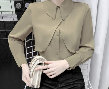 Uue mudeli nööpide ja pikkade varrukatega särk