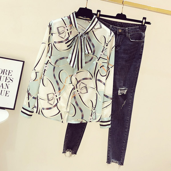 Ženska košulja s dugim rukavima, visokim ovratnikom i trakom