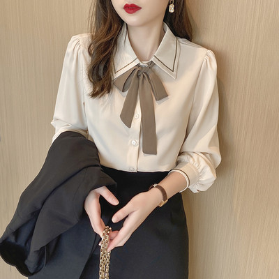 Moderna ženska košulja s trakom i gumbima