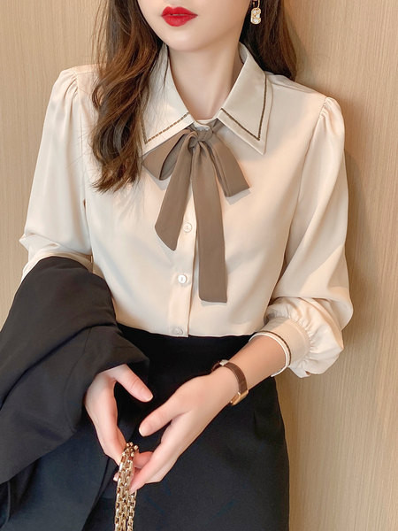 Moderna ženska košulja s trakom i gumbima