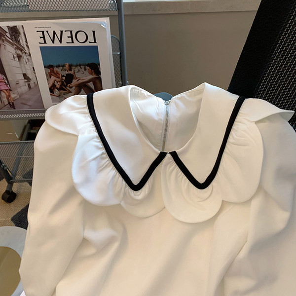 Uue mudeli naiste valge lootosevarrukate ja lipsudega särk