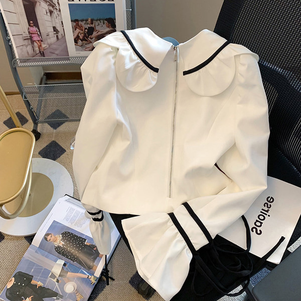 Uue mudeli naiste valge lootosevarrukate ja lipsudega särk