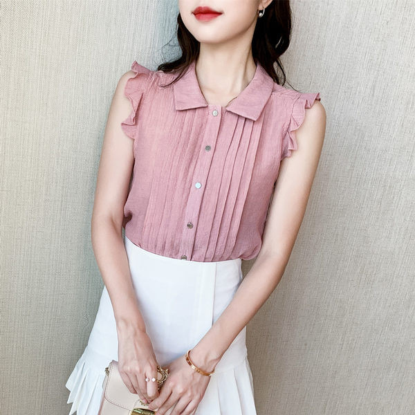 Naiste moekas lokkide ja klassikalise kraega särk