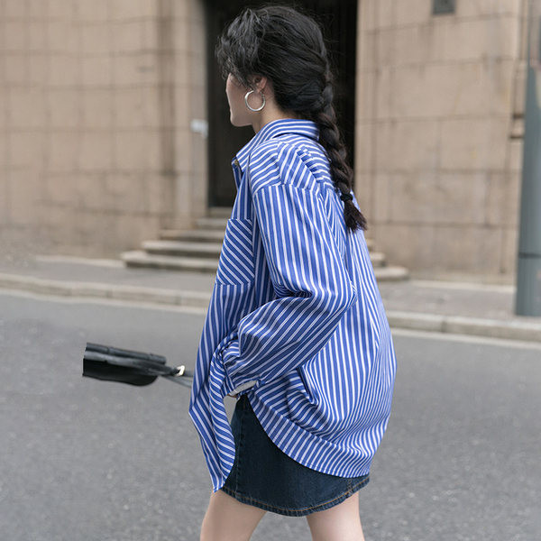 Triibuline lai taskuga särk