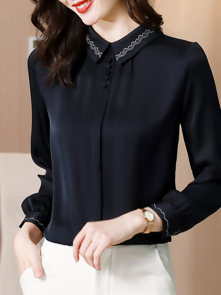 Moderna košulja s klasičnim ovratnikom i vezom