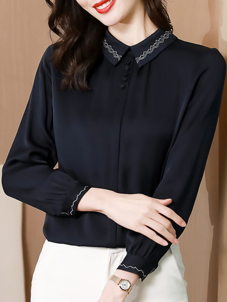 Moderna košulja s klasičnim ovratnikom i vezom