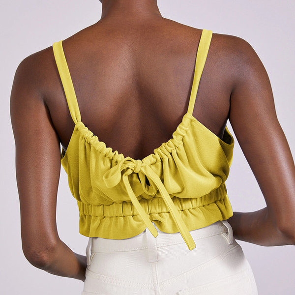 Късо дамско бюстие с овално деколте и къдри