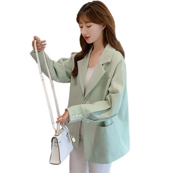 Μοντέρνο γυναικείο σακάκι με τσέπες και κουμπιά