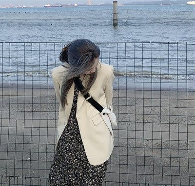 Φαρδύ γυναικείο μπουφάν με κουμπιά