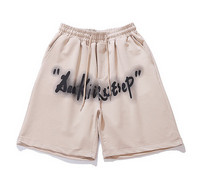 Γυναικείο φαρδύ κοντό αθλητικό σορτς με επιγραφή