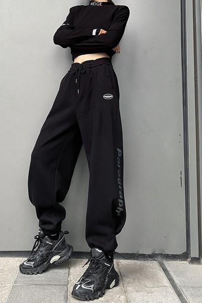 Naiste spordipüksid kirjaga