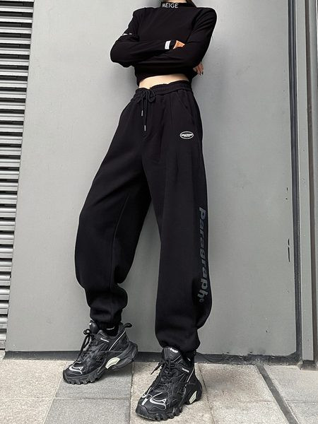 Naiste spordipüksid kirjaga