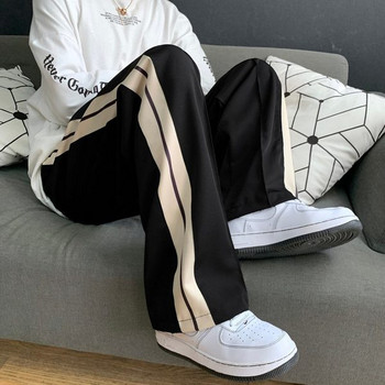 Широк модел дамски спортен панталон с кантове