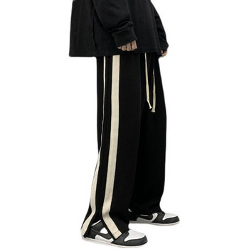 Дамски дълъг широк панталон в черен цвят 