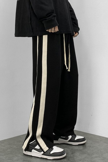 Дамски дълъг широк панталон в черен цвят 