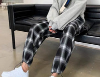 Дамски кариран панталон с връзки - черен цвят 